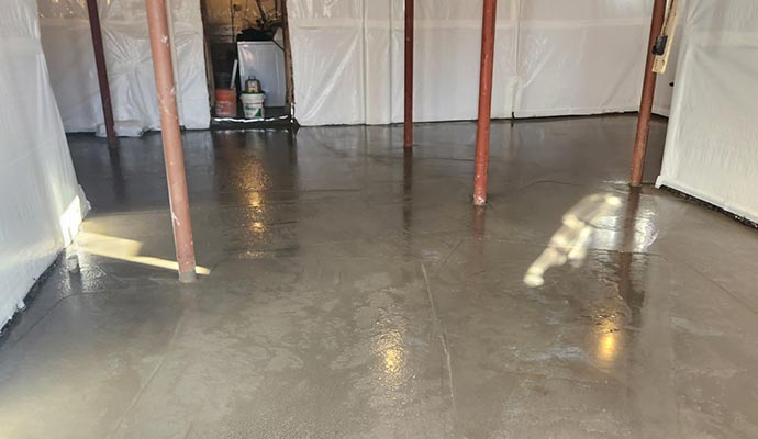 Basement floor prepared for waterproofing and finishing