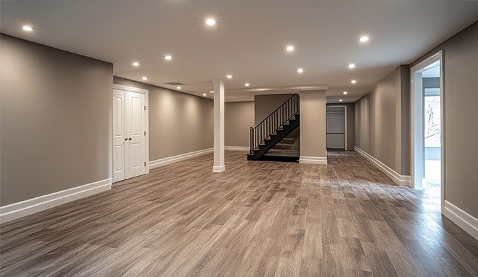 Modern basement living space with elegant finishes