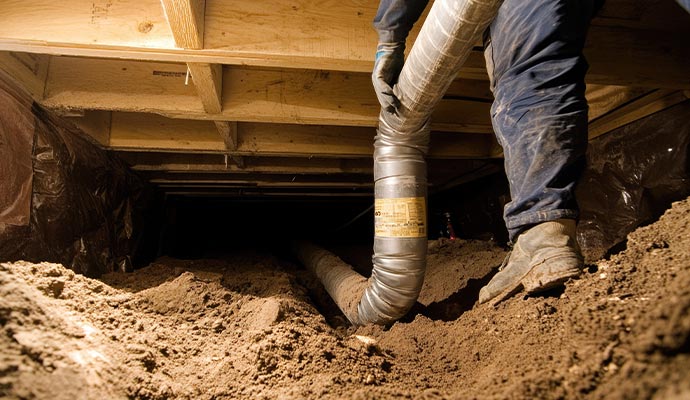 A crawl space undergoing repair to fix structural or moisture issues