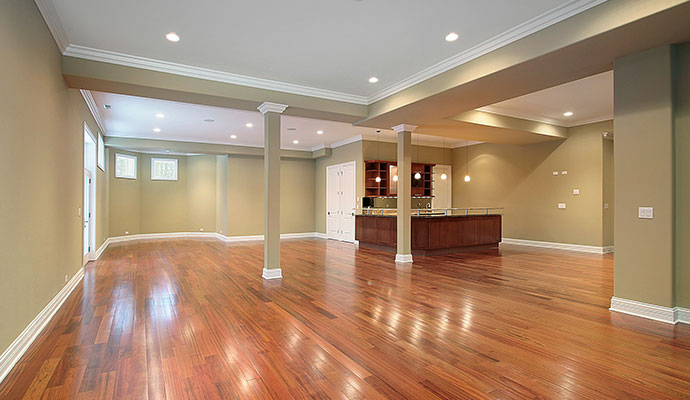 Finished basement interior with hardwood flooring