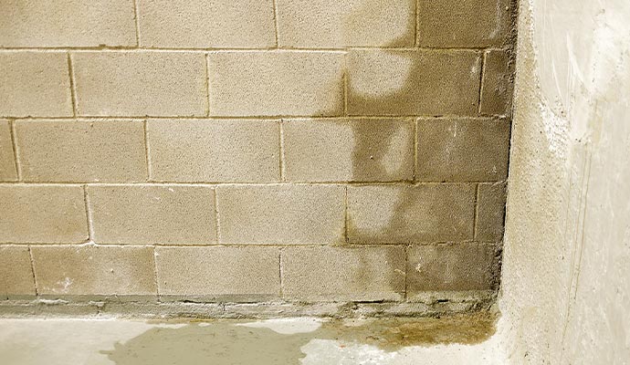 flood in building leaking wall crack repair