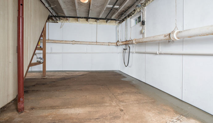 Installed basement waterproofing system