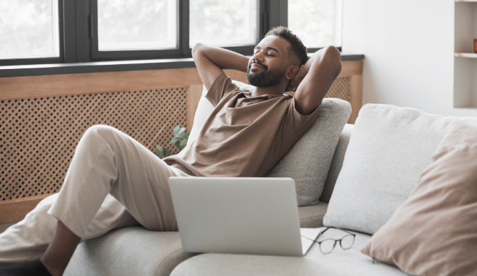 Person relaxing on sofa