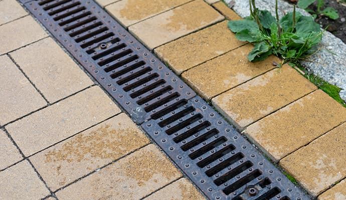 Newly installed entryway drainage system to prevent water accumulation