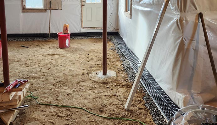 Perimeter drainage channel in basement